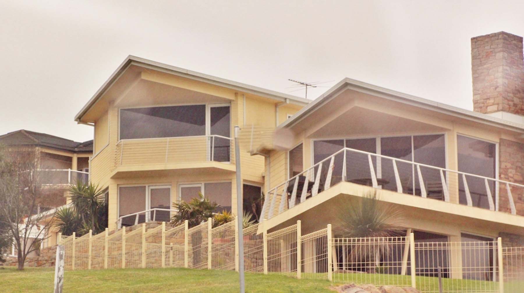 Residential home with large glazed windows